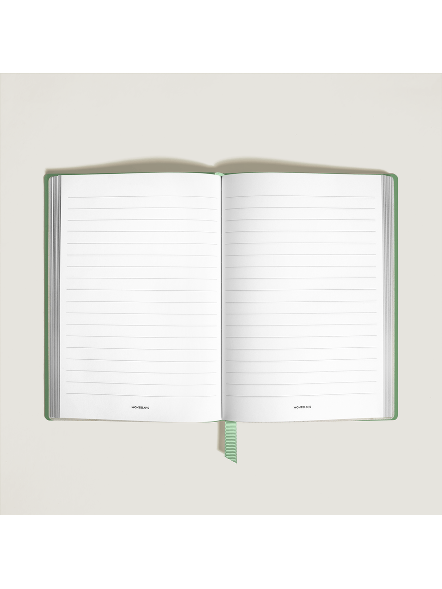 Cuaderno mediano verde páginas con líneas