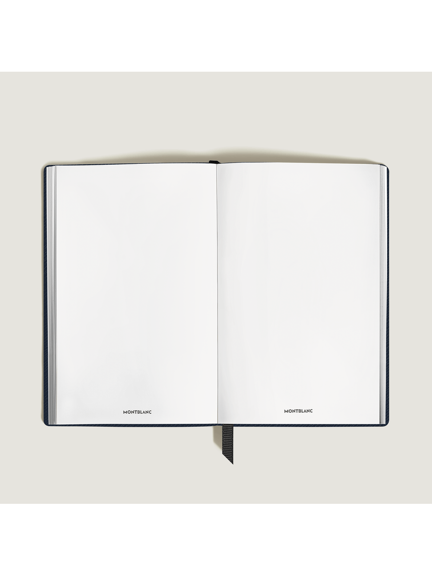 Cuaderno pequeño piel azul tinta hojas en blanco