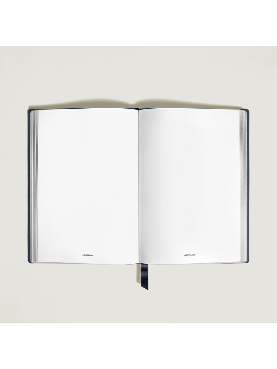 Cuaderno mediano piel azul tinta hojas en blanco