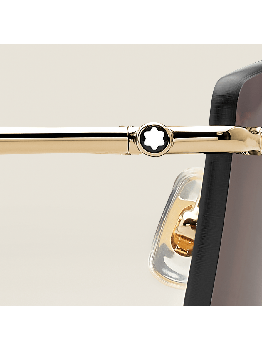 Lentes de sol rectangulares con montura metálica dorada