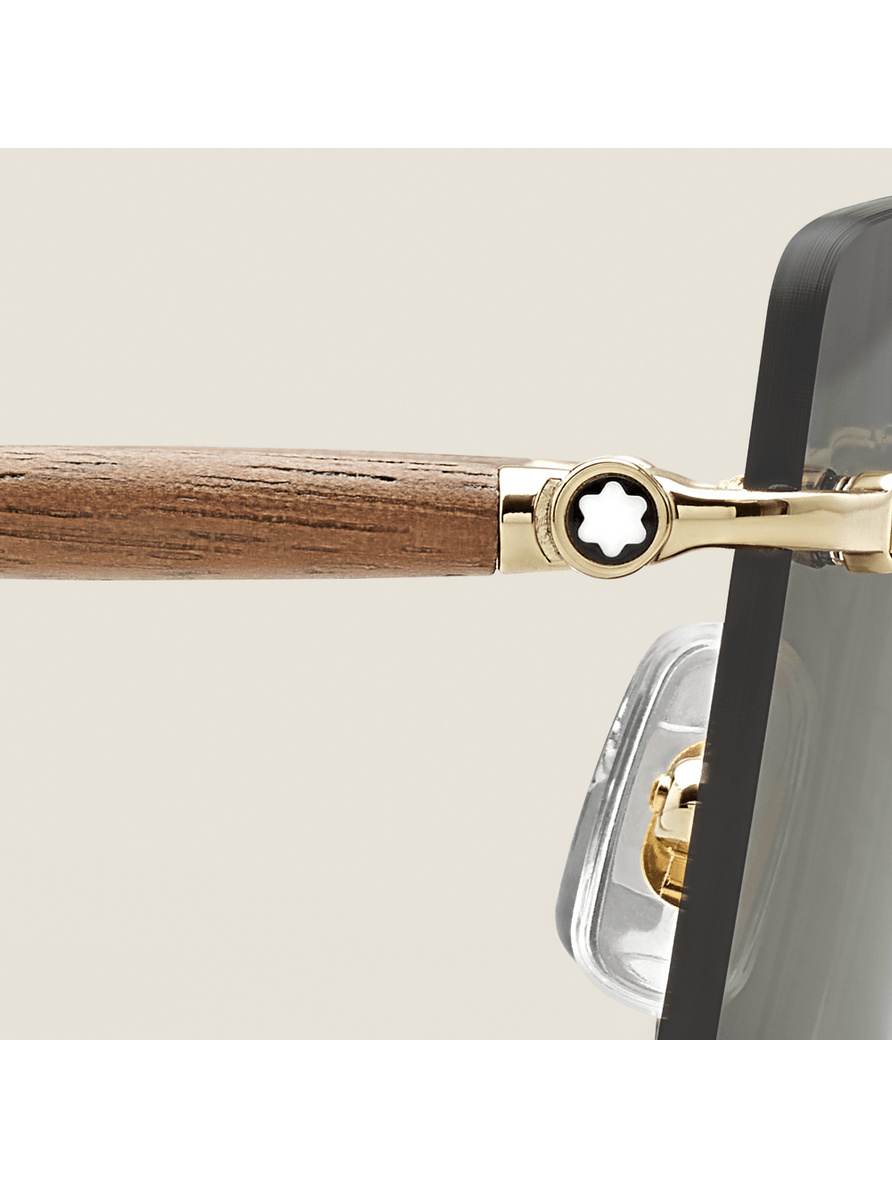 Lentes de sol cuadrados con montura metálica dorada